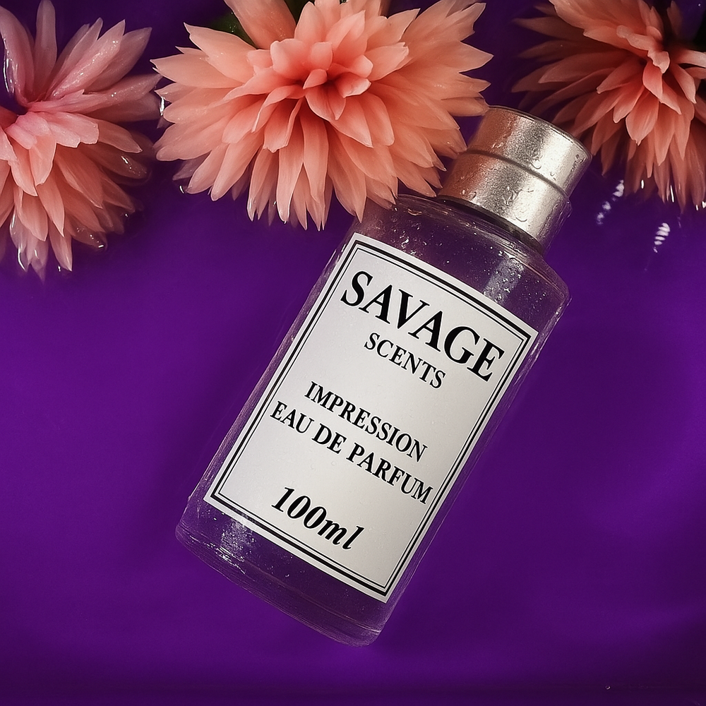Savage Scents perfume bottle with pink flowers on a purple background